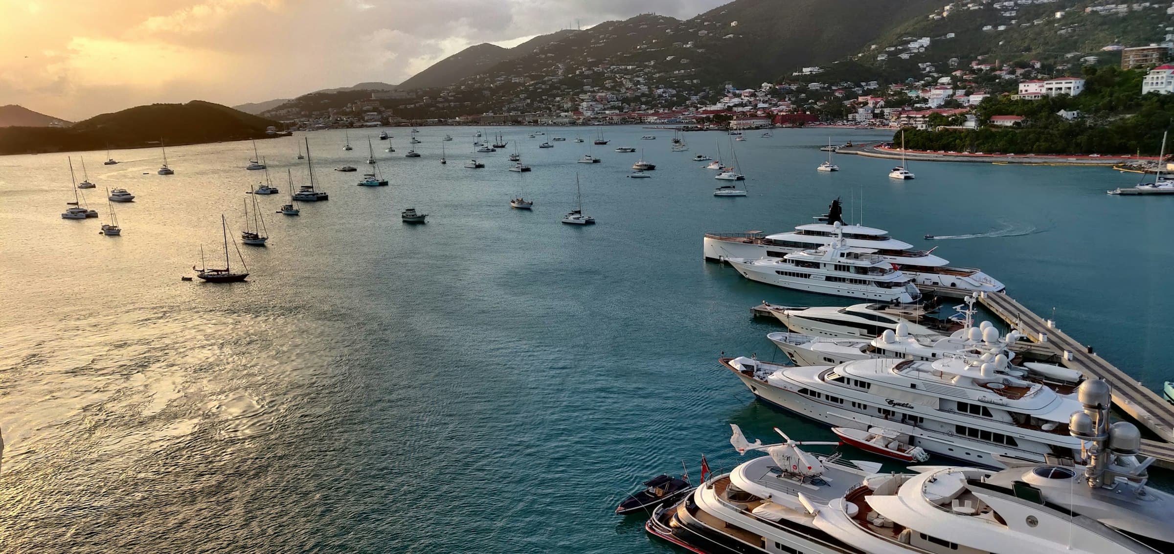 Charter fleet moored side by side at golden hour